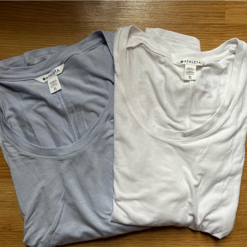 Two Athleta cloudlight stratus tees. Xl blue (nwt) and white (EUC)
